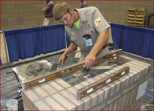 This photo shows Bradley Wright working on his composite project at the 2010 SkillsUSA national masonry contest.