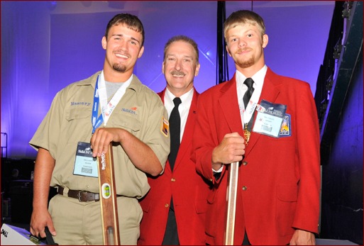 SkillsUSA Executive Director Timothy W. Lawrence gave special congratulations to the divisional winners of the 2010 national masonry competition.  Pictured backstage are secondary division winner Brandon Boldon (l), Laurence (c) and post secondary winner Bradley Wright (r), winner of three national masonry championships.