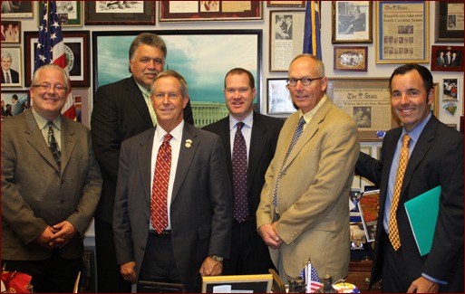 Jeff Buczkiewicz, Mackie Bounds (back row), Congressman Joe Wilson of South Carolina, Eric Dell, Paul Odom and Matt Keelen.