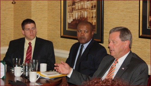 Jon Davenport, Calvin Brodie and Congressman Tom Latham meet at the Capitol Hill Club.