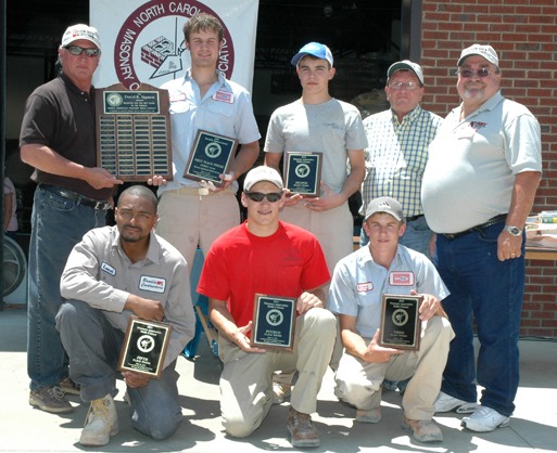 Shown bottom (left to right): Fifth-place finisher, Lamar O’Neal, Brodie Contractors; fourth-place finisher and 2010 defending champion Cory Huneycutt, Paul’s Masonry; and third-place finisher, Landon Huntley, McGee Brothers. Top (left to right), Contest Chairman Gary Joyner; 2011 Champion Wriston McGee; second-place finisher Kale Hallman of McGee Brothers; Contest Head Judge Freddy Koontz; and NCMCA President Larry Kirby.  