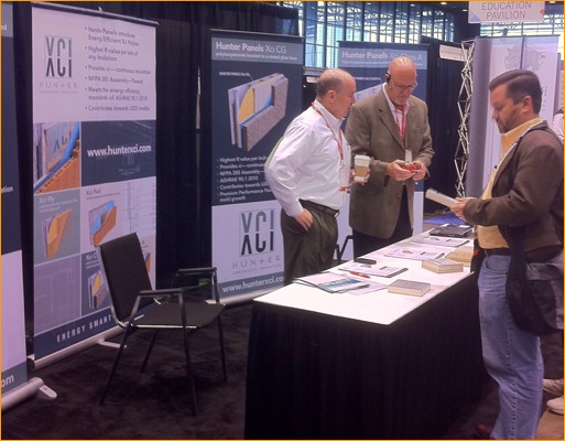 Hunter Panels talked with CONSTRUCT show attendees at their active booth.