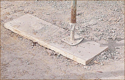 Photo 1: Short mud sills reduce shovel work and insure that they won’t be re-used for scaffold planks.