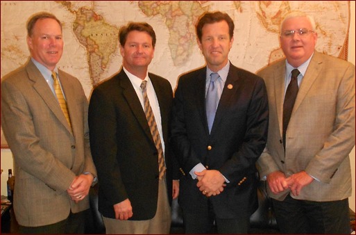 Shown are Mark Wilhhelms, David Gillick, Missouri Congressman Russ Carnahan, and John Smith.