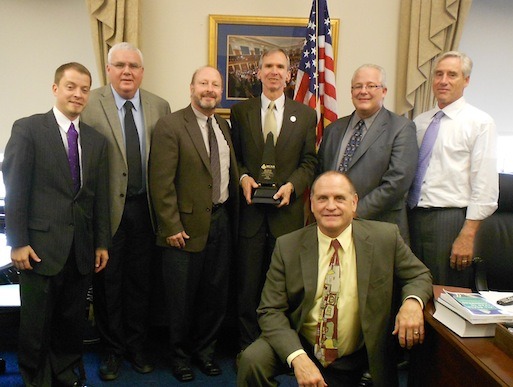 The MCAA Prosperity Award is presented to Illinois Congressman David Lipinsky. Shown are Steve Borg, John Smith, Steve Hunt, Congressman Lipinsky, Jeff Buczkiewicz, Mark Kemp, and Jim O'Connor.