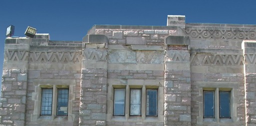 Shown is the Phi Delta Theta house at Butler University in Indianapolis with damaged limestone. 