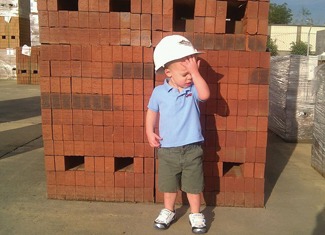 Speaking of the future of masonry, shown is my 2-year-old nephew, Rowan, on the brickyard at South Georgia Brick Co. on a hot day in Albany, Ga.