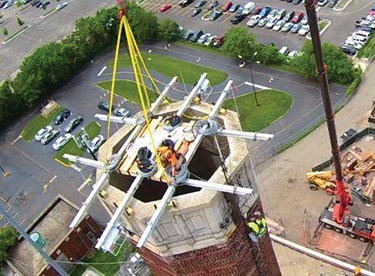 suspended scaffolding solution for tuck-pointing and brick repair work chimney stack