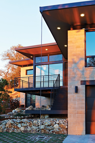 Eighteen-foot masonry walls built of Watershed Block, a new type of structural masonry that uses less cement and incorporates unwashed, locally sourced recycled aggregate. The home sat atop the epicenter of the August 2014 Napa earthquake but suffered no damage. Image credit: ©Jacob Snavely